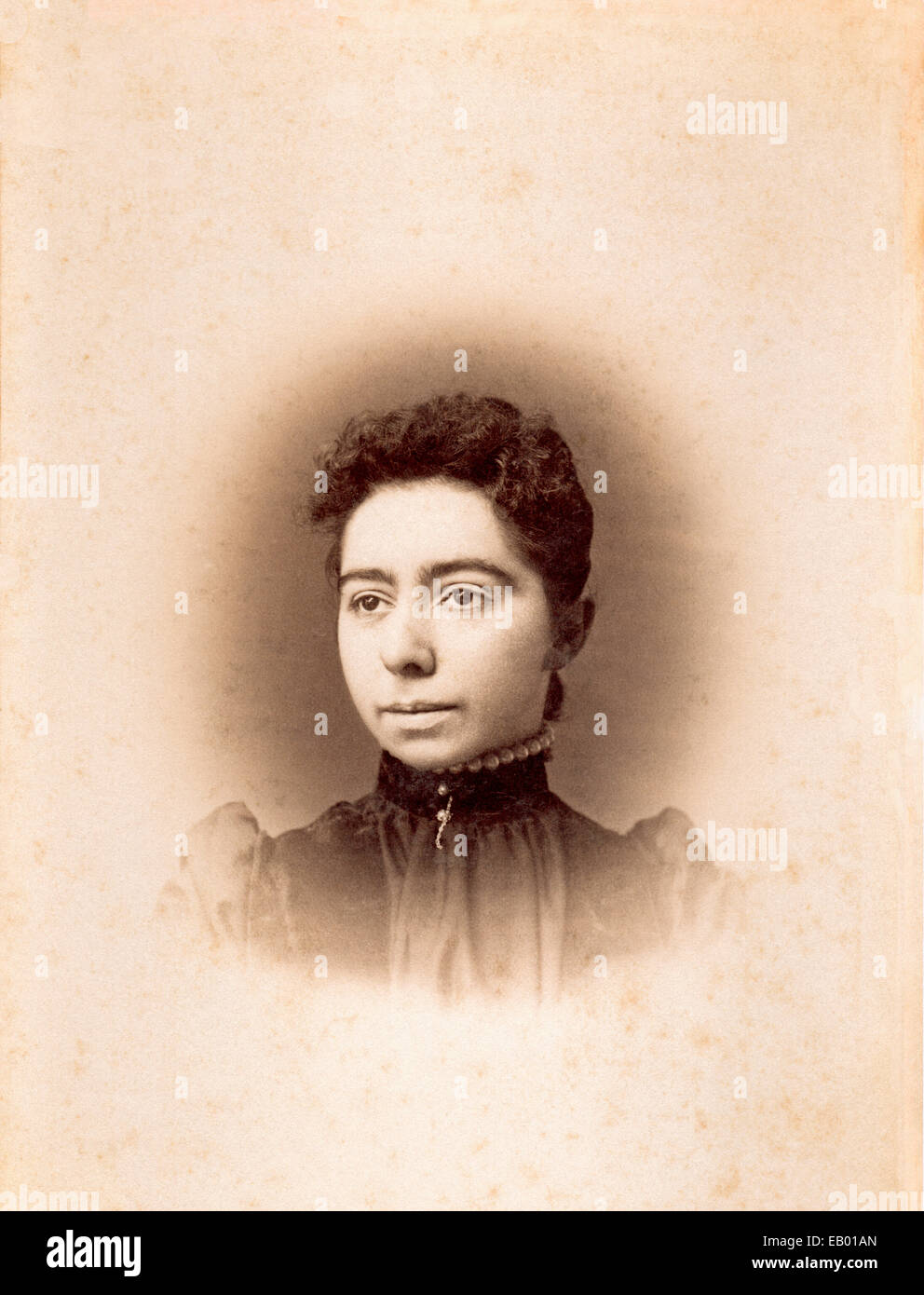 Vintage image of an ethnic female, 1889, wearing high-necked dress. Stock Photo