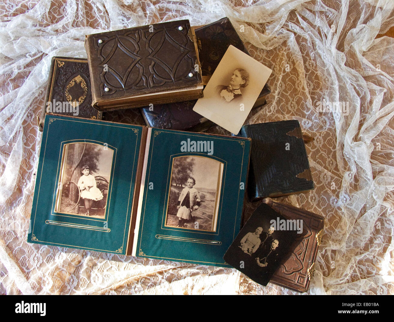 A collection of vintage photo albums and tintypes from the late 1800s and early 1900s from the US. Stock Photo