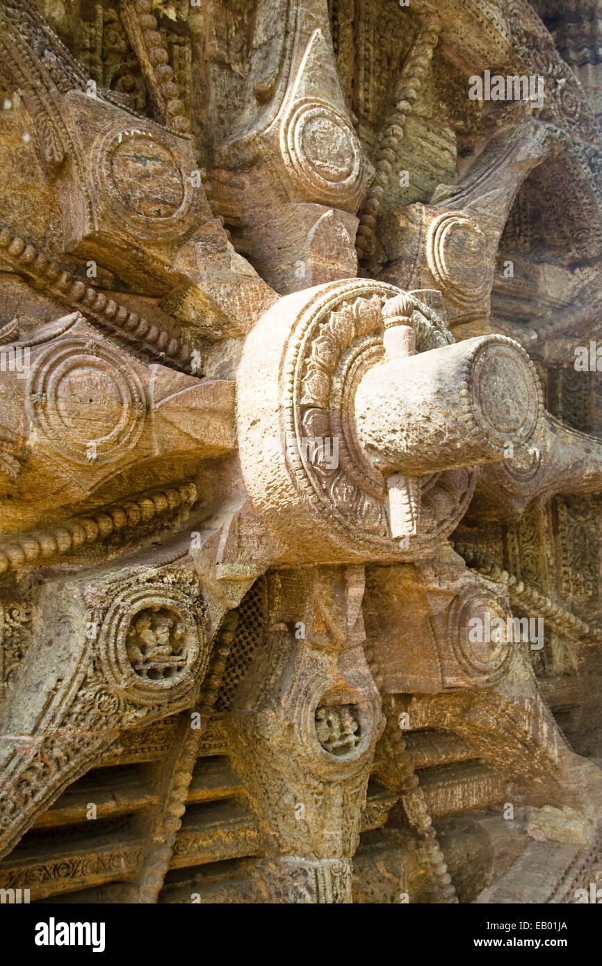 Closer view of stone wheel spokes, axle and wedge pin at Sun Temple, Konark, Orissa, India, Asia Stock Photo