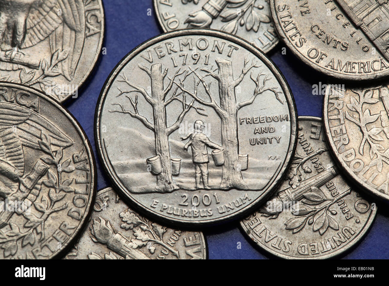 Coins of USA. Maple trees with sap buckets and Camel's Hump Mountain depicted on the US Vermont quarter (2001). Stock Photo
