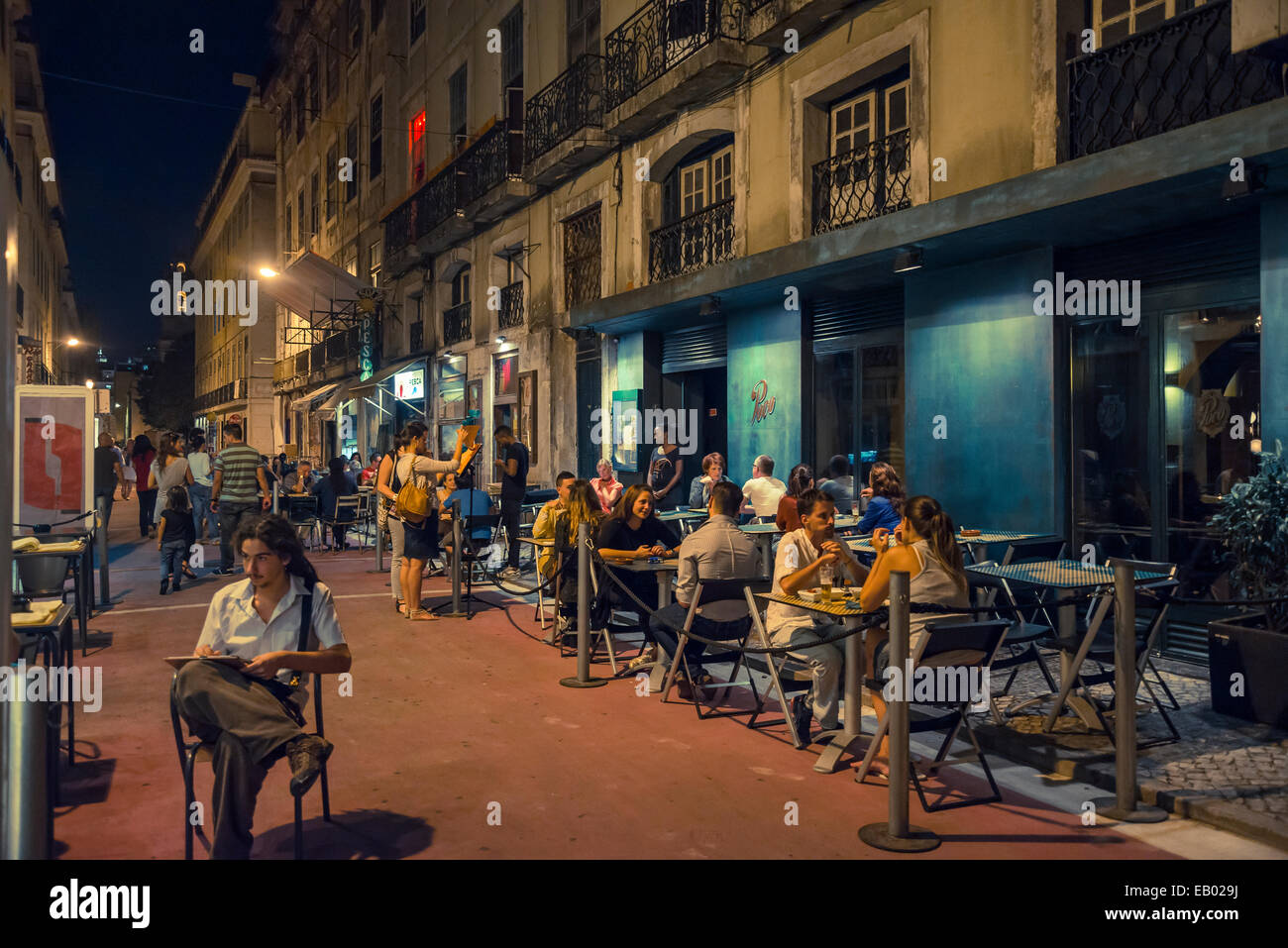 Restaurants at night in Rua Nova do Carvalho, Cais do Sodre district, Lisbon, Portugal Stock Photo