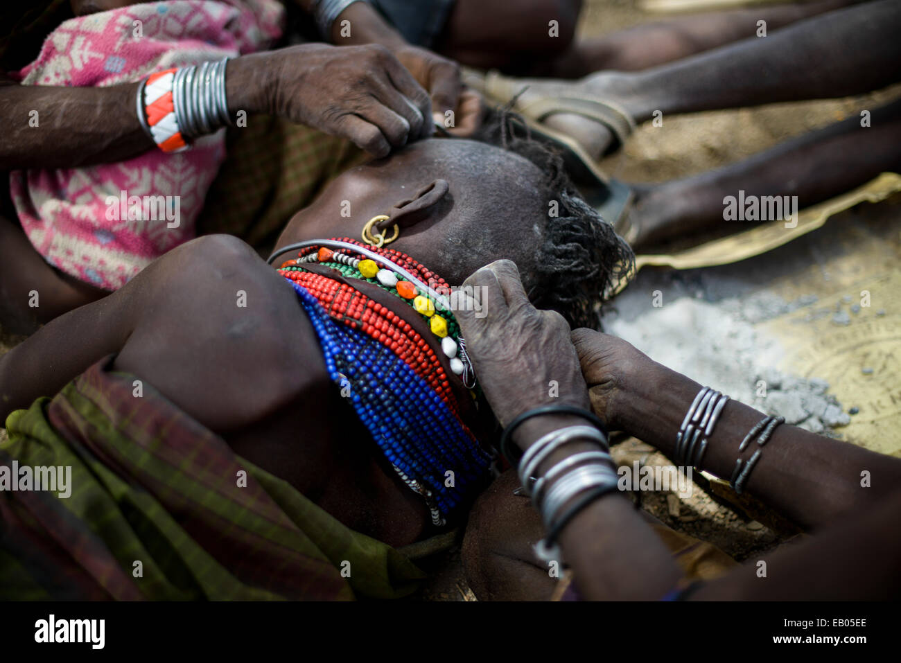 Turkana women arranging their hairs, Kenya Stock Photo