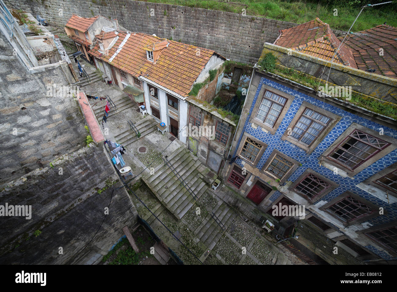Porto in Portugal, traditional Portuguese houses along city alley with steps, looking down from above view. Stock Photo
