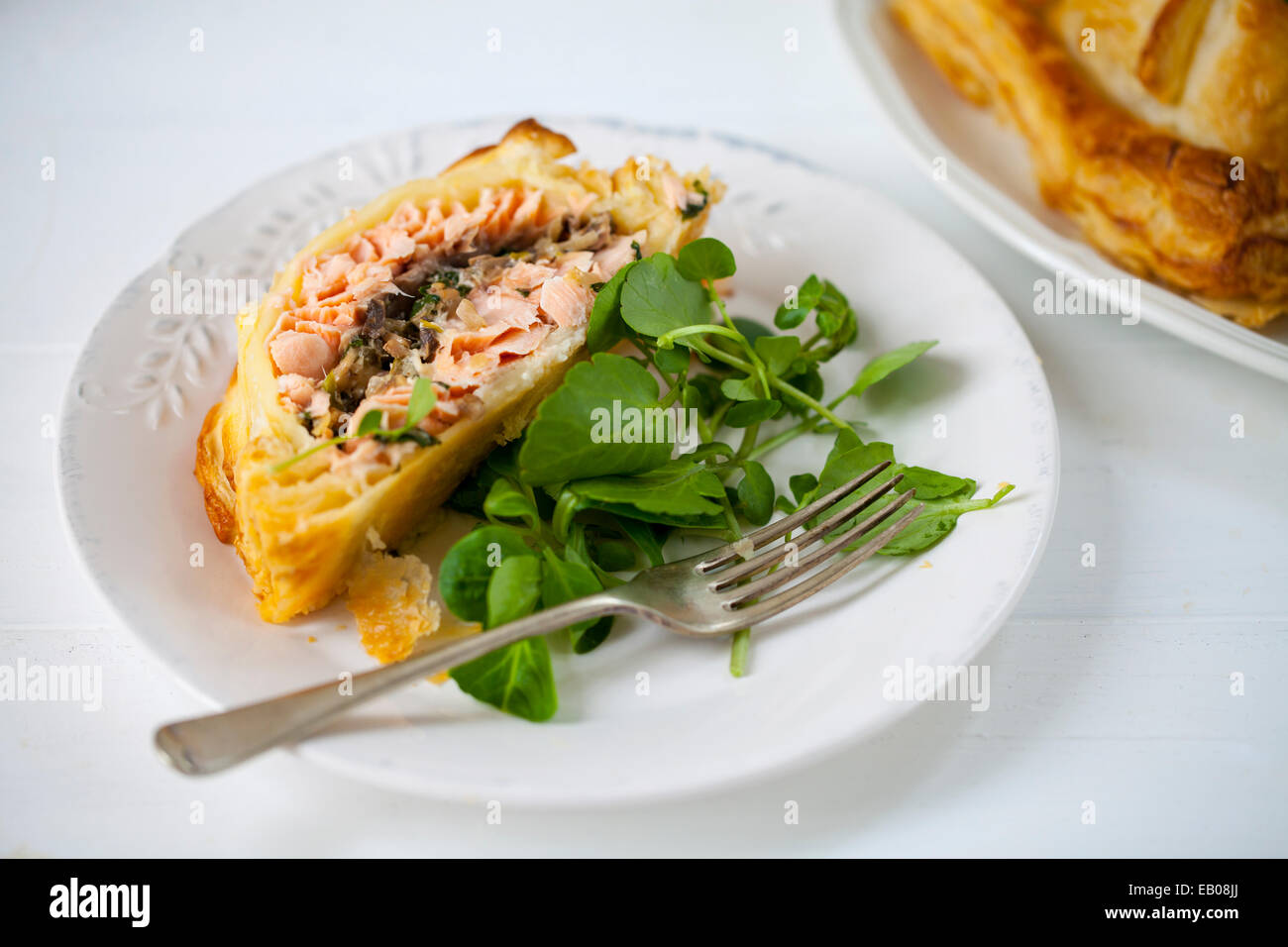Salmon en croute with mushroom and watercress filling Stock Photo Alamy