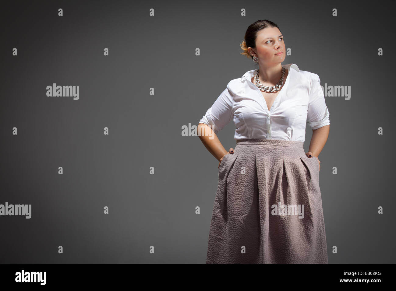 plus-size model fashion shot in studio Stock Photo