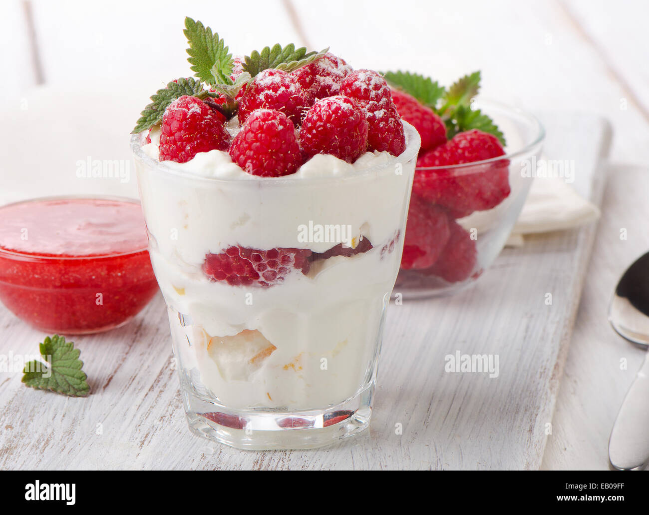 Mint Raspberry Dessert Dessert with raspberries and mint leaf. Selective focus Stock Photo - Alamy