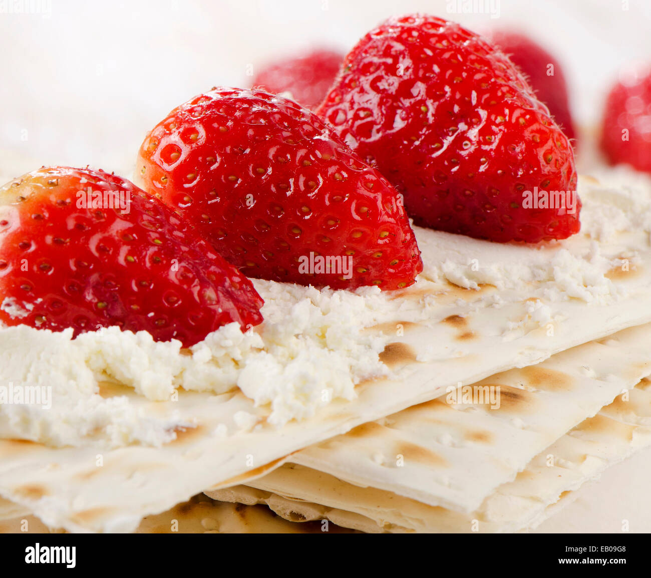 matzoh With cheese and berries  on a wooden table. Selective focus Stock Photo