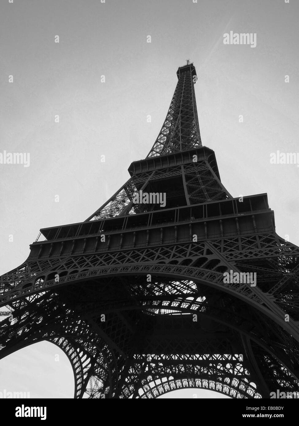View of Eiffel tower, Paris in black and white from the ground, looking to the top. Stock Photo
