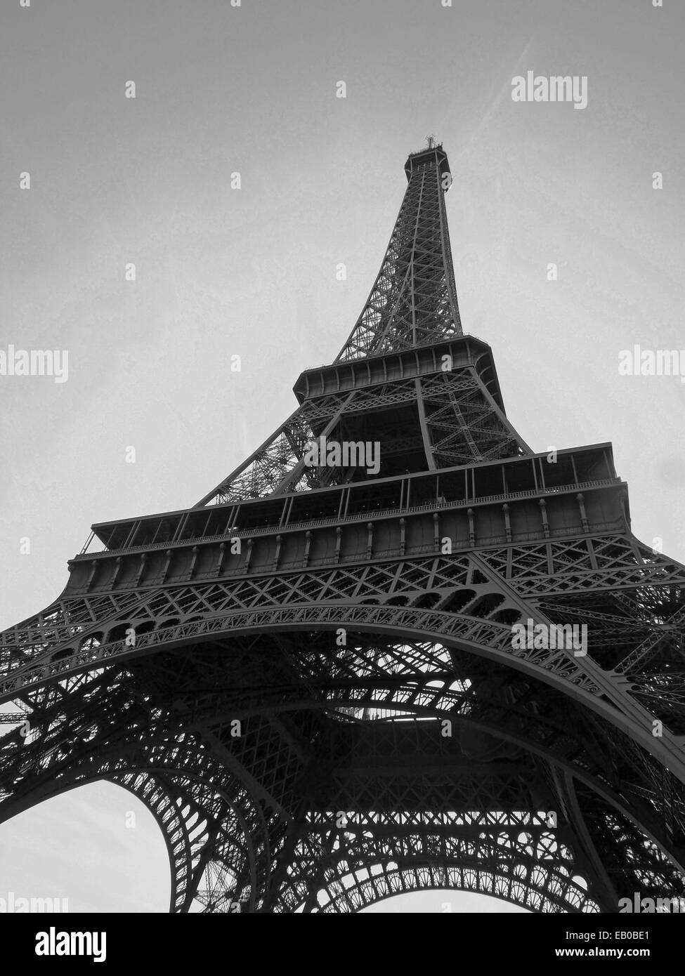 View of Eiffel tower, Paris in black and white from the ground, looking to the top. Stock Photo