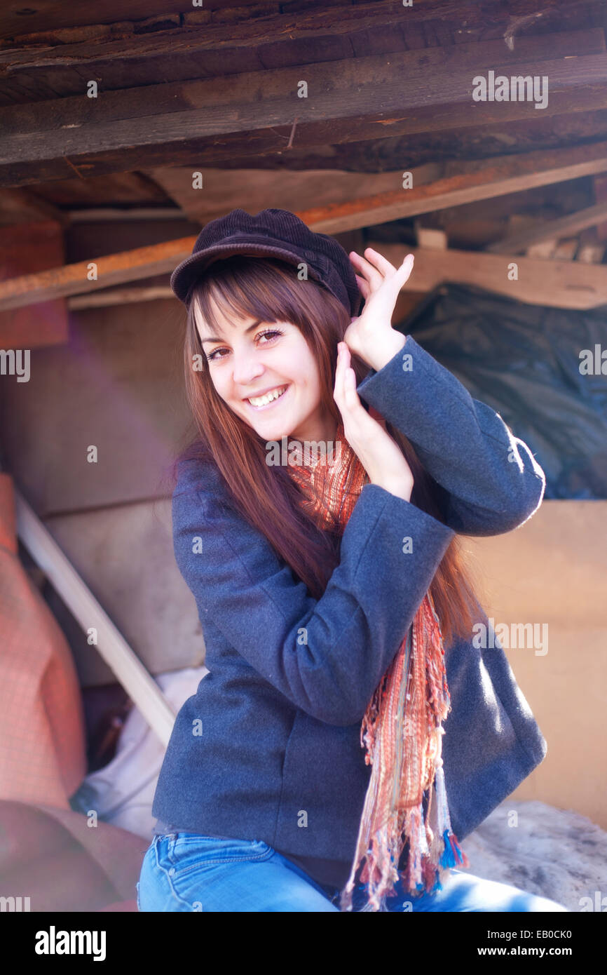Cheerful girl in a cap on a sunny day Stock Photo