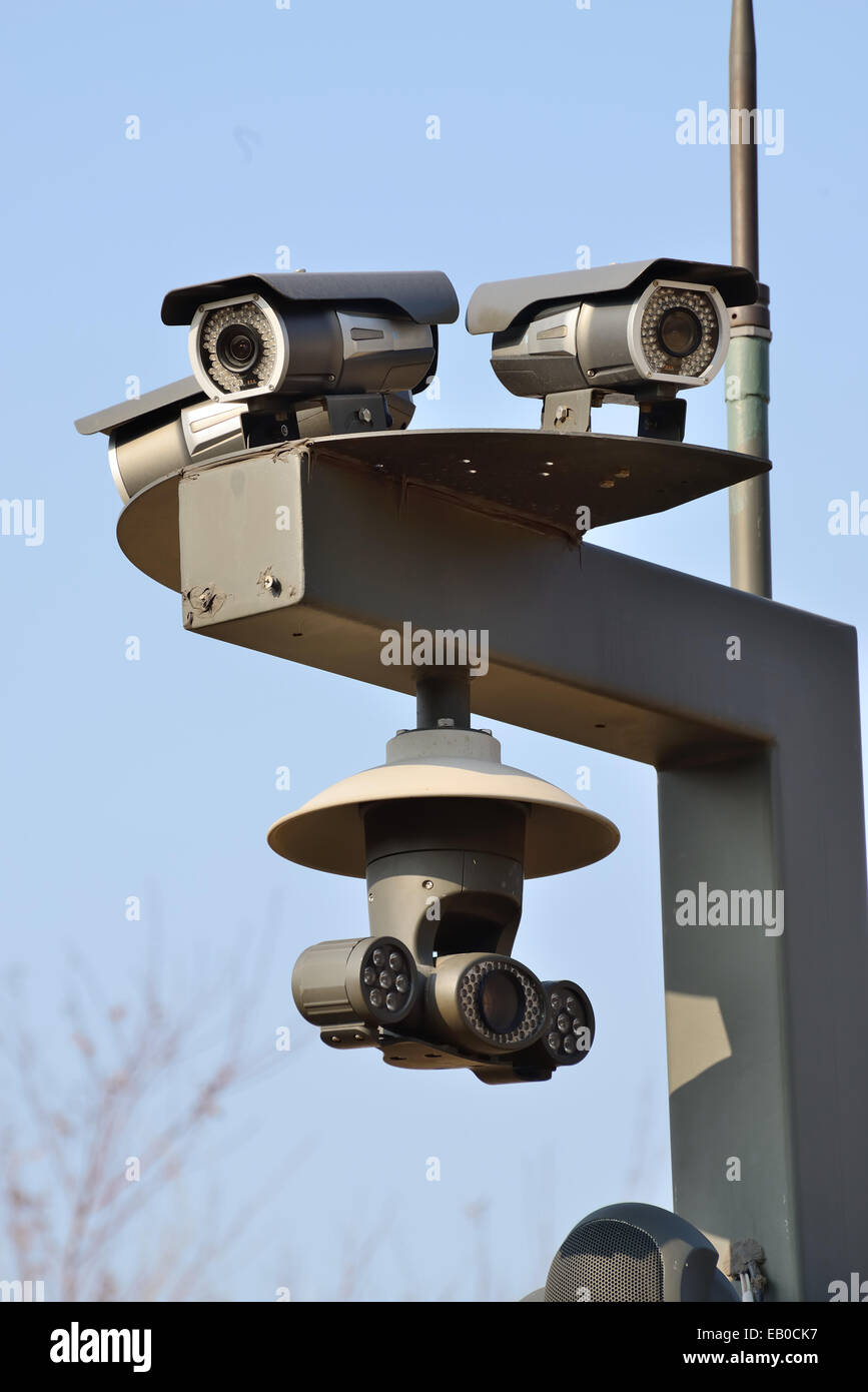 closeup of three Infrared CCTV surveillance cameras Stock Photo
