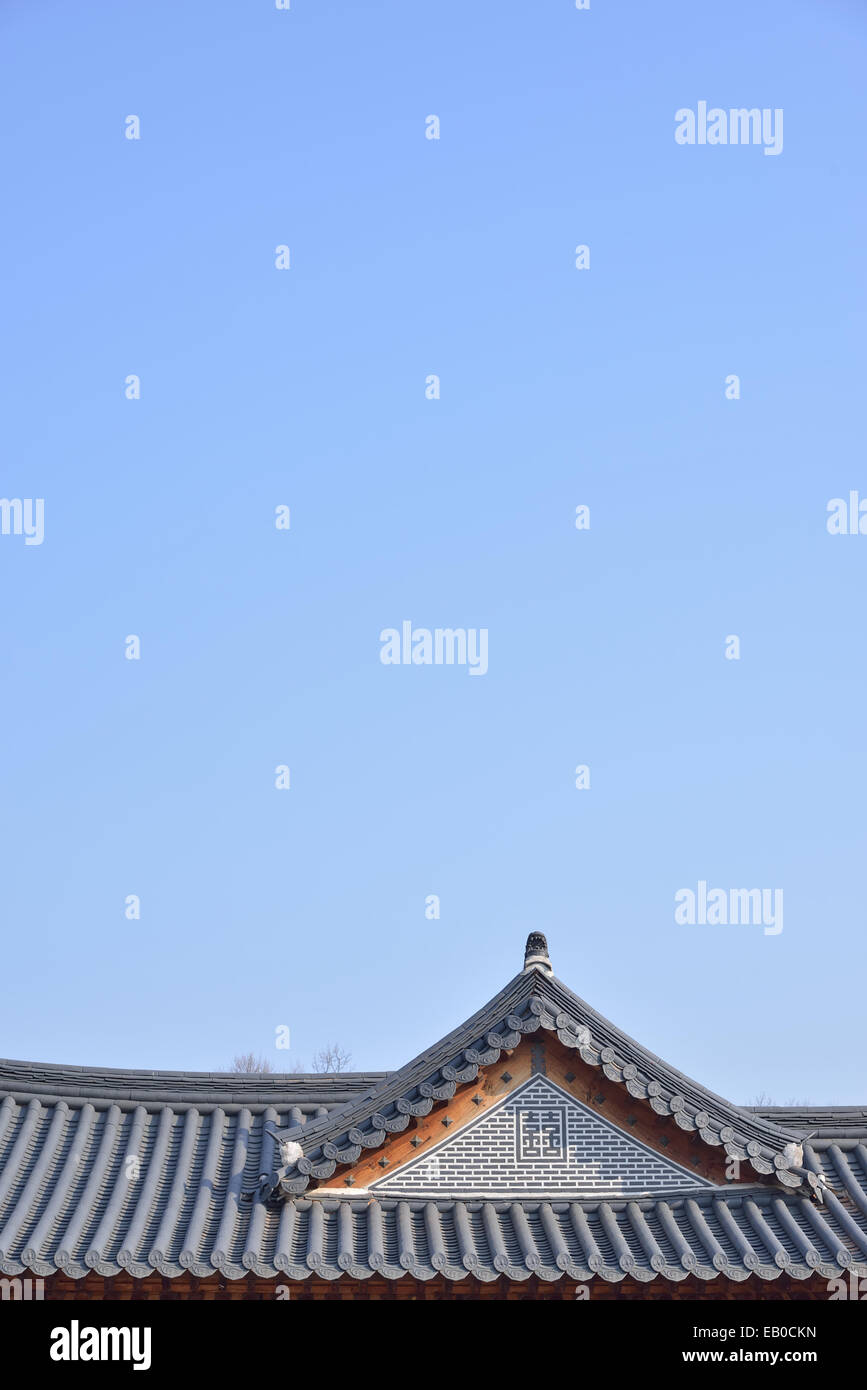 tiled roofs of Gyeongbokgung with clear sky in Seoul, Korea Stock Photo