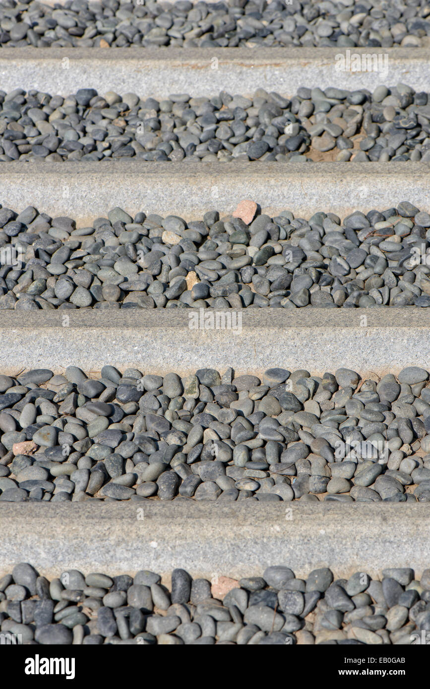 pavement for foot reflexology by walking on pebbles Stock Photo