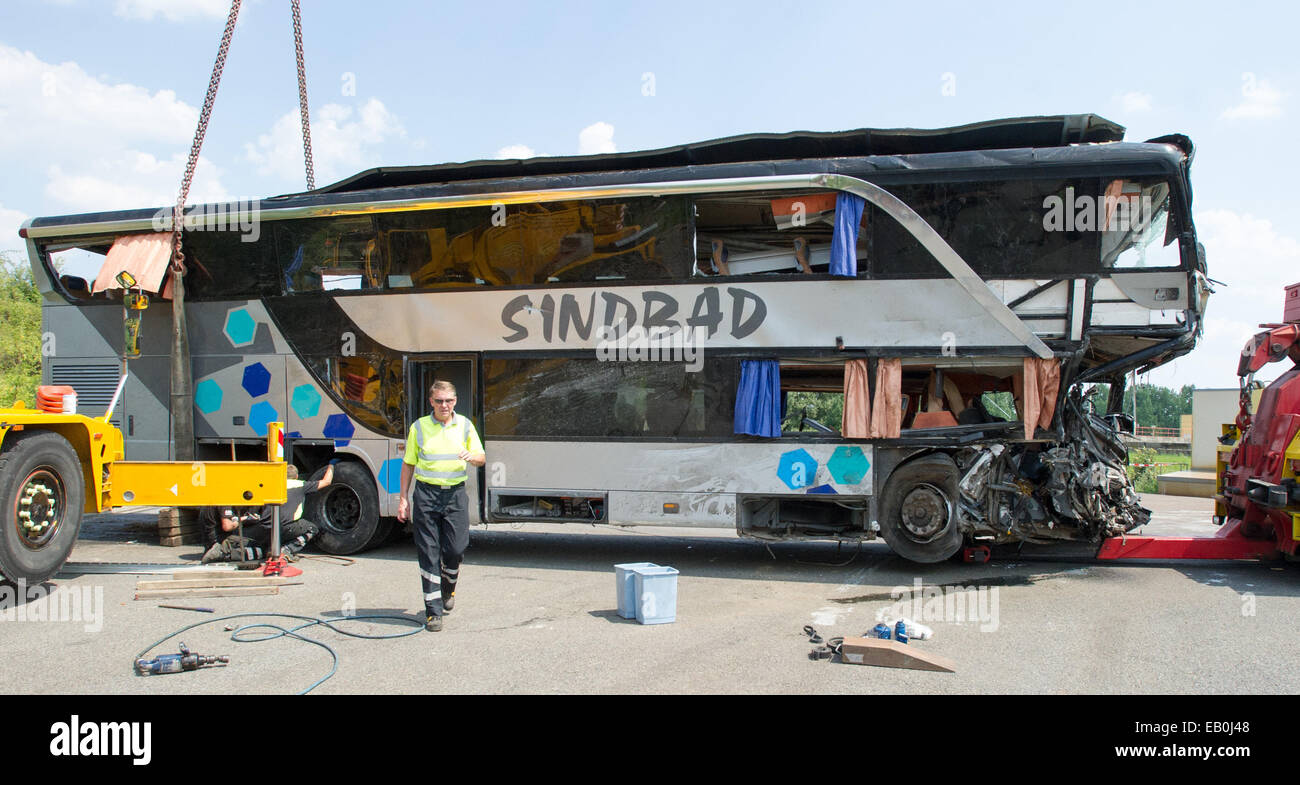 FILE - An archive picture dated 19.07.2014 shows a wrecked tourist bus with the label of Polish travel company Sinbad on the A4 motorway near Dresden-Neustadt, Germany. Photo: Peter Endig/dpa Stock Photo