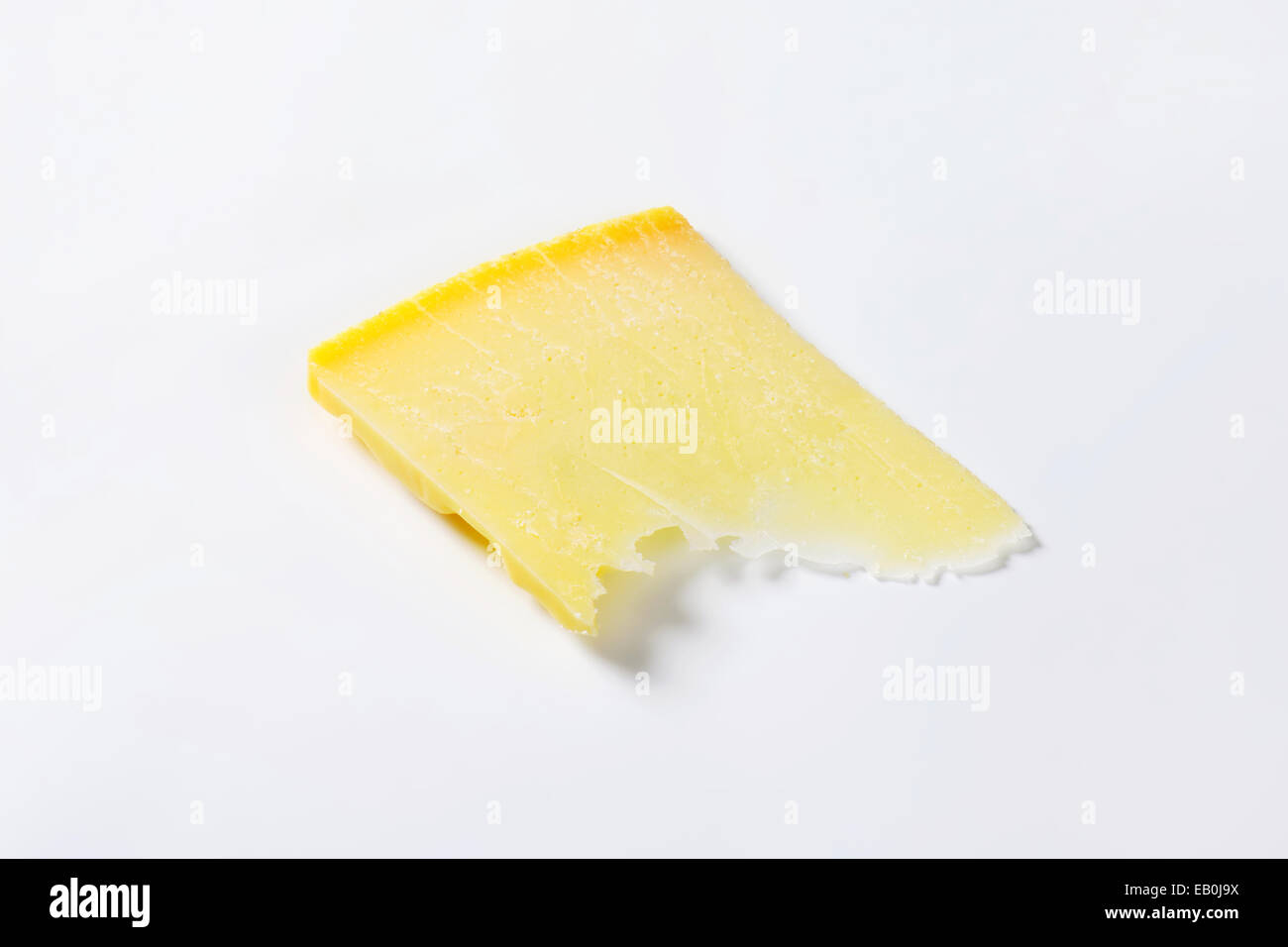 Thin slice of Parmesan cheese Stock Photo Alamy