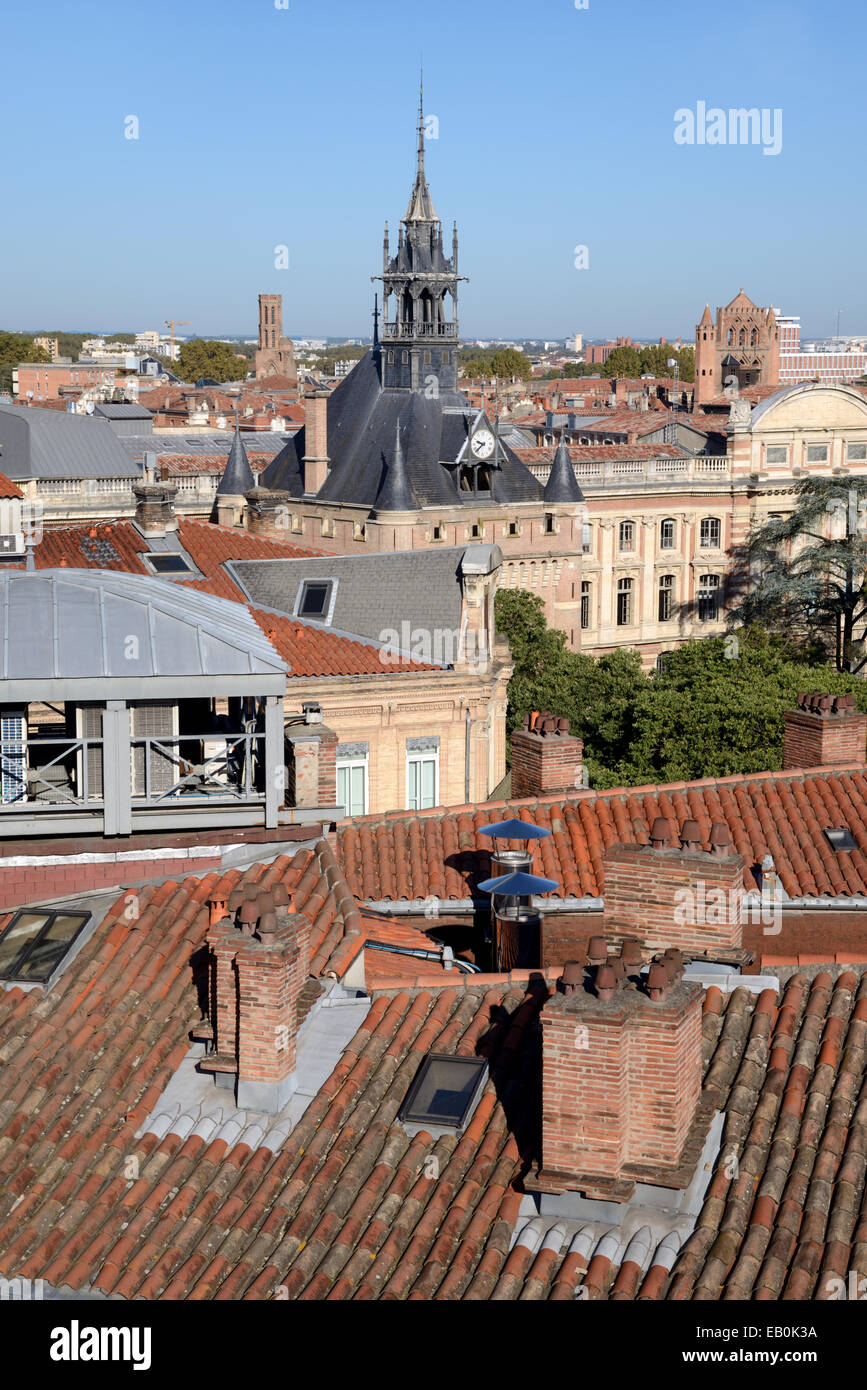 View over Rooftops of Toulouse with the Medieval Keep or Donjon du Capitole on the Capitole Square Toulouse France Stock Photo