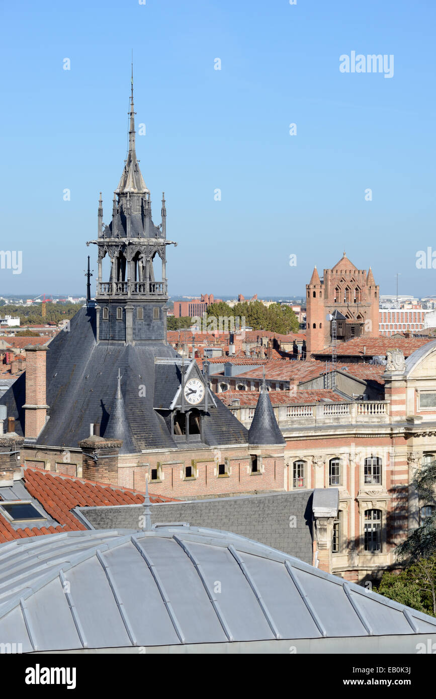 View over Rooftops & the c19th Pinnacle of the Medieval Tower Dungeon or City Keep near the Capitole Toulouse France Stock Photo