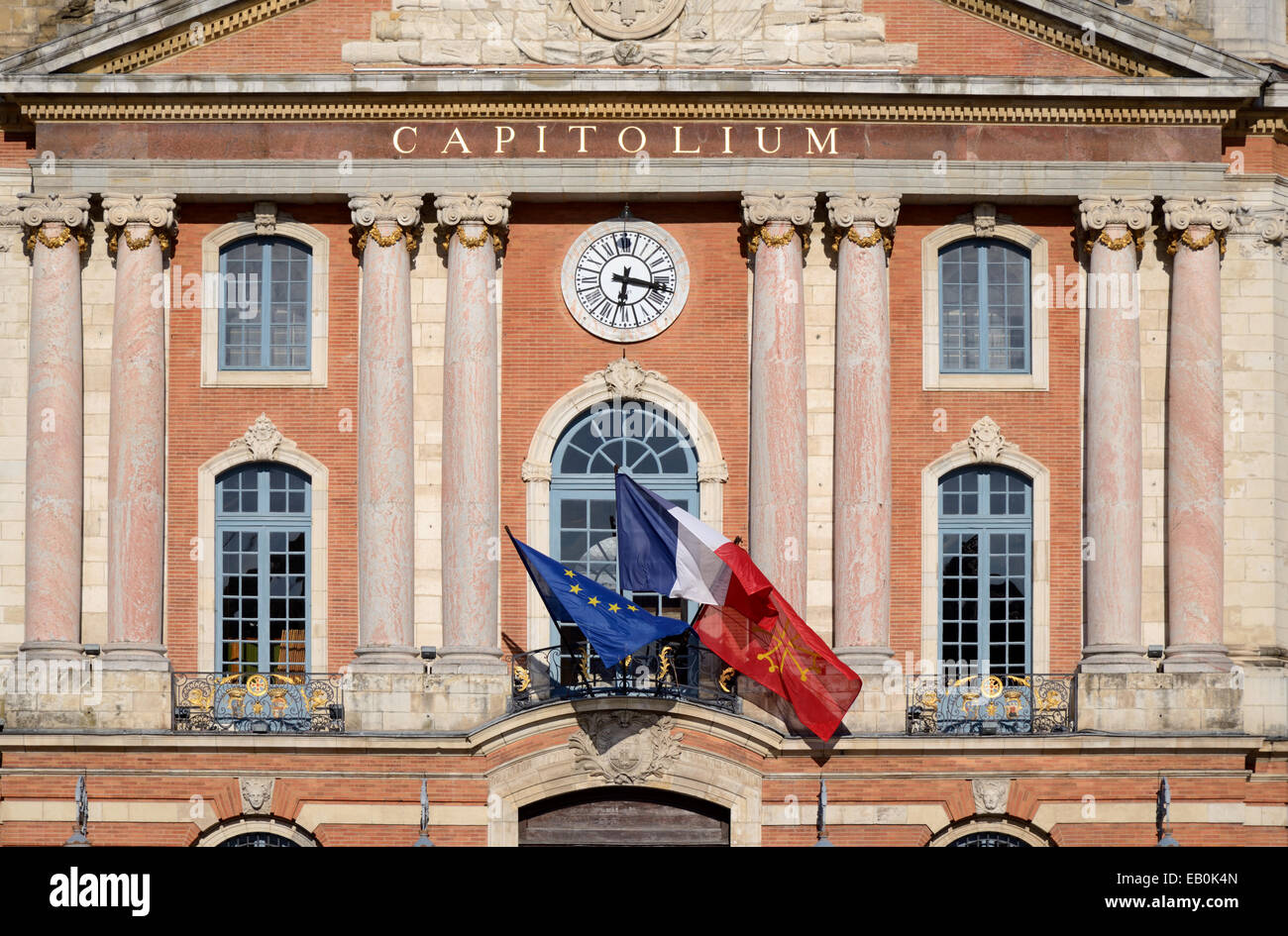 Town Hall or Mairie Facade on the Place du Capitole Town Square with French & European Flags Toulouse France Stock Photo