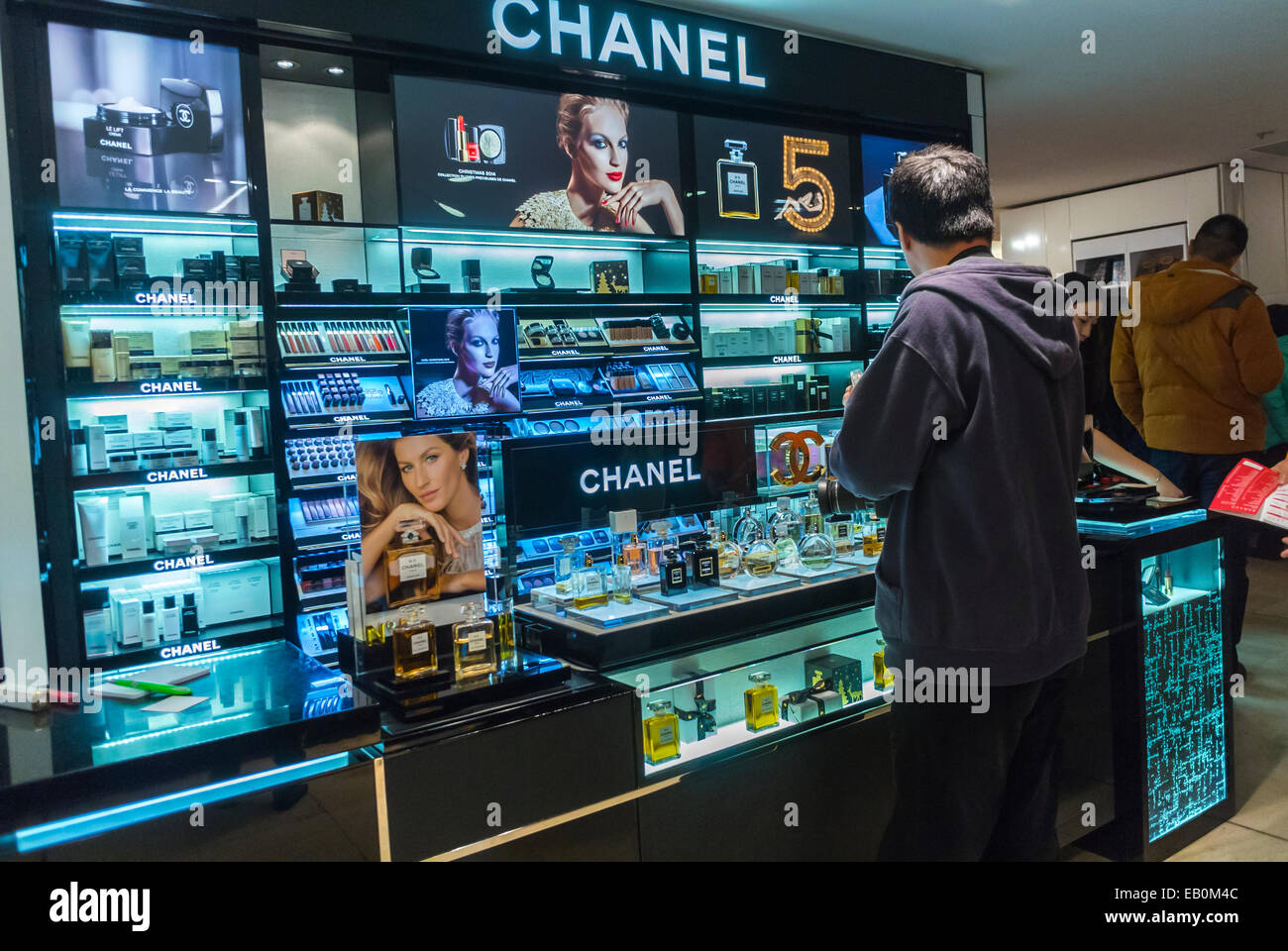 Paris, France, Chinese Tourists Shopping inside Luxury Shop, Perfumes, in French Department Store, 'Galeries Lafayettes' Chanel perfumes Stall parfumeur, bottles of perfume, parfum flacon Stock Photo