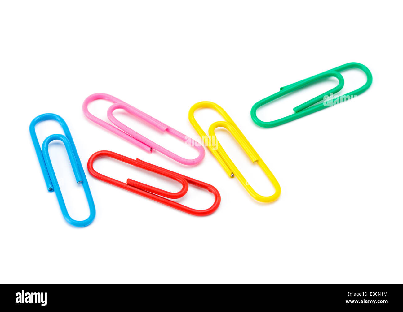 Colored paper clips on a white background closeup Stock Photo