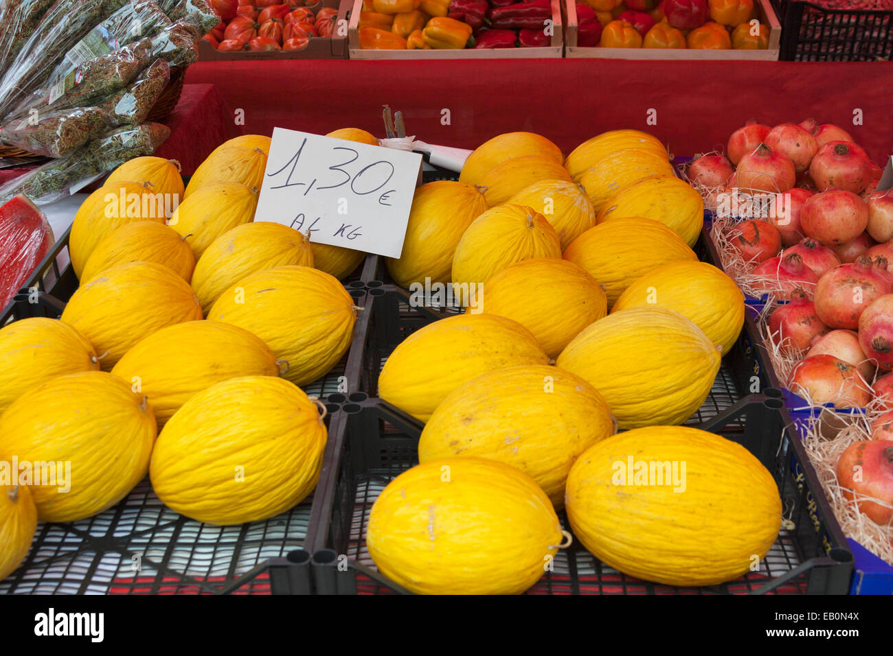melons selling in boxes with a price tag in the italian street market Stock Photo