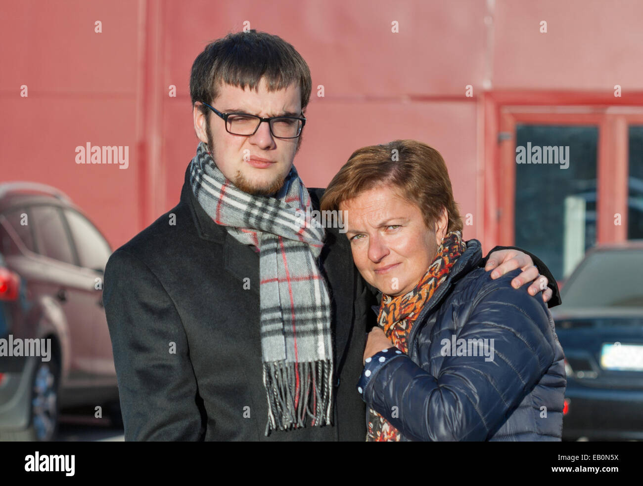 mother and son portrait in autumn clothing outdoor Stock Photo
