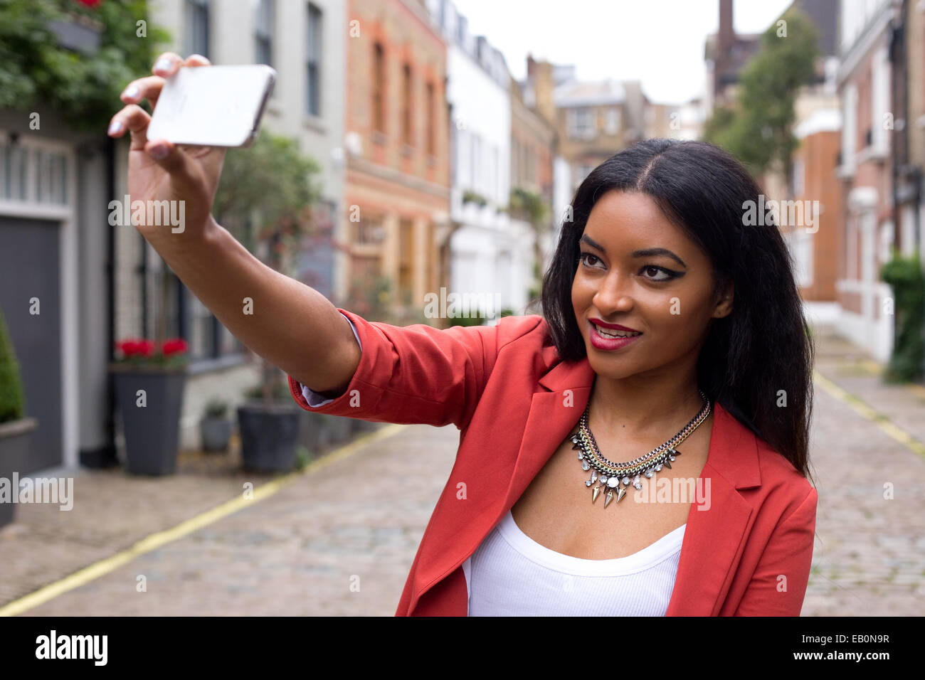 young woman taking a selfie Stock Photo