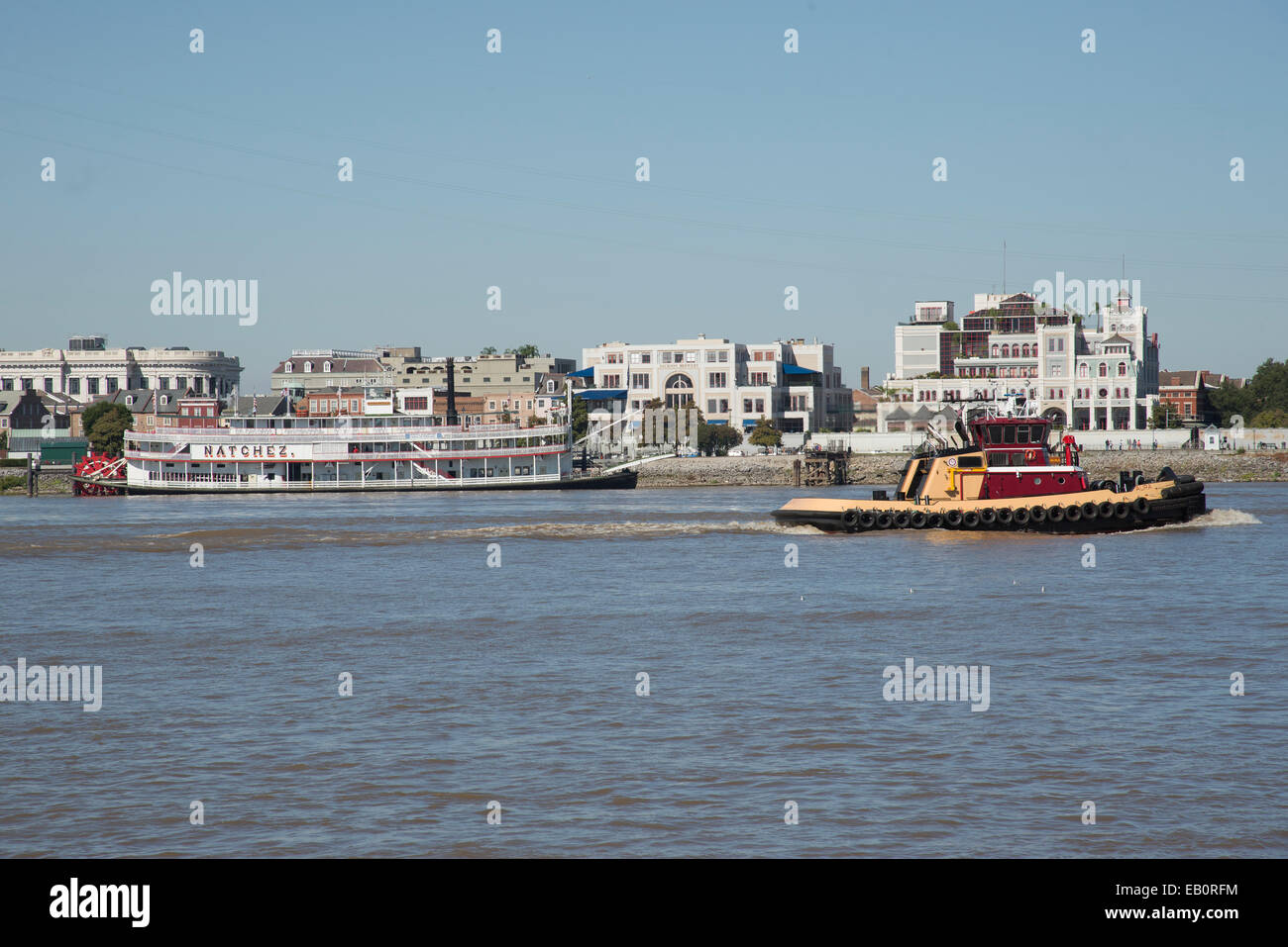 Waterfront New Orleans Louisiana USA Riverboat and a tug on the