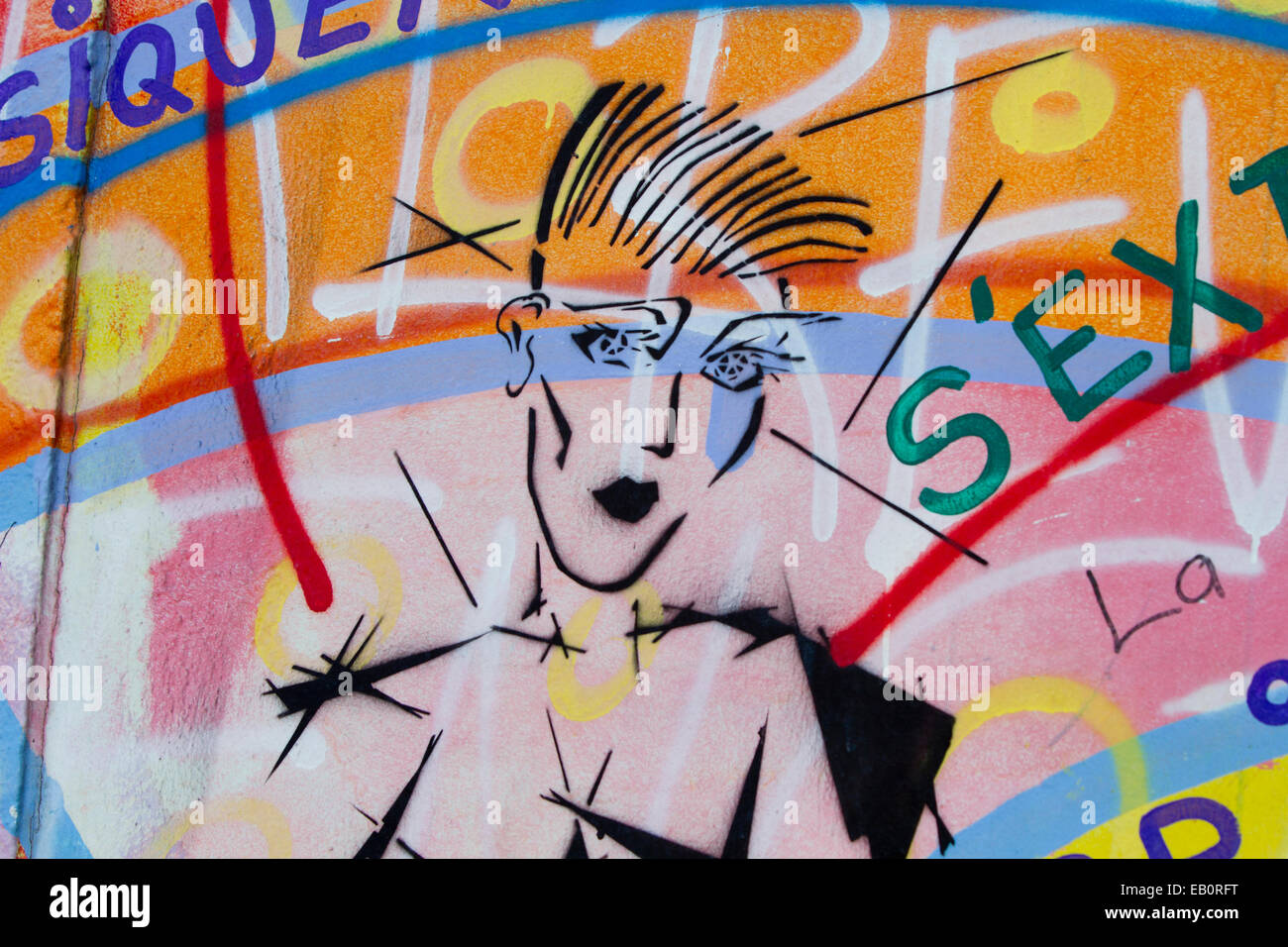 Berlin Wall Cartoon girl tags Graffiti street art Stock Photo