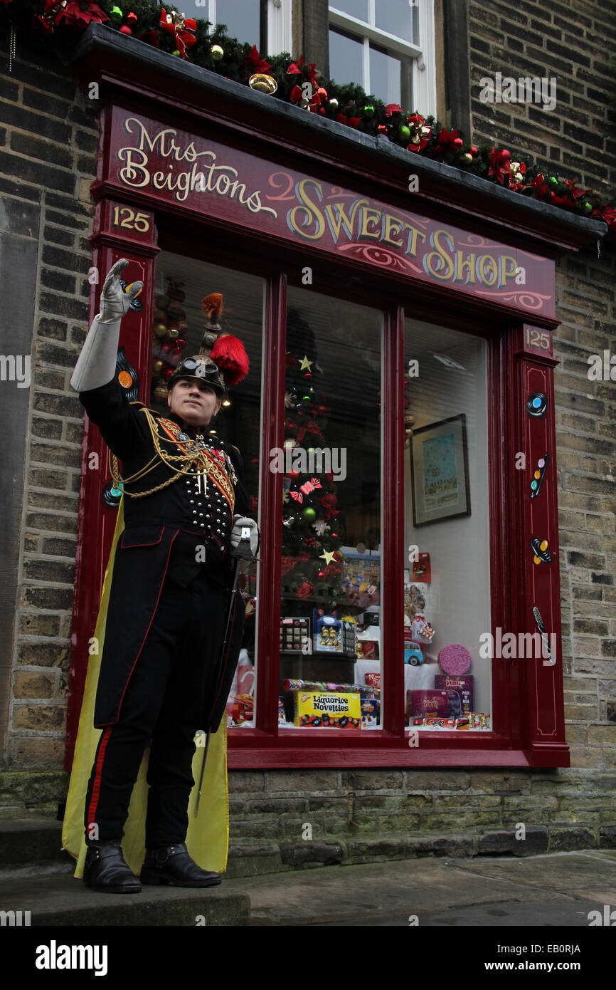 Man dressed in military steampunk costume outside Mrs Beightons traditional sweet shop Haworth during the steampunk weekend Stock Photo