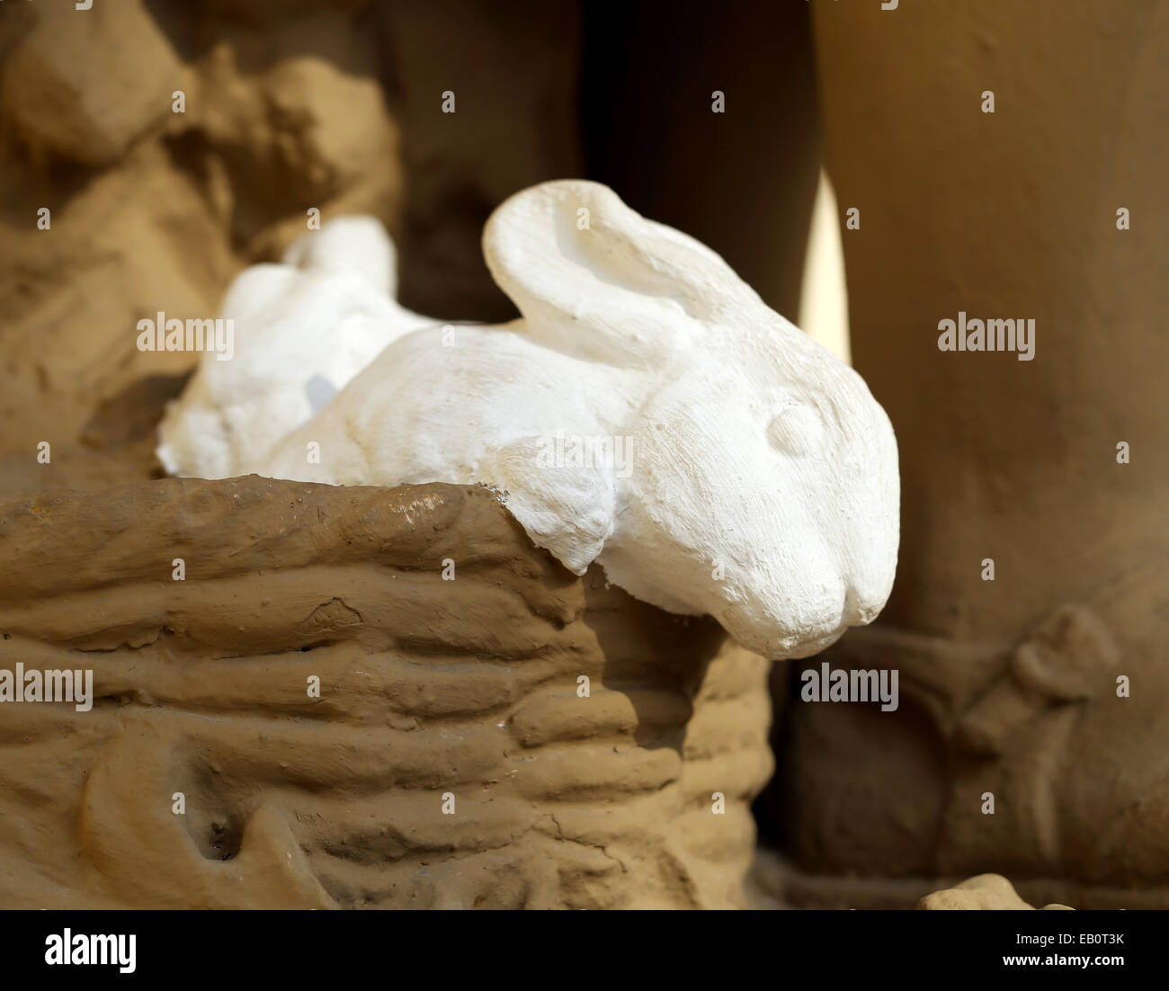 Statue of a girl with a rabbit in the exhibition pavilion building ...