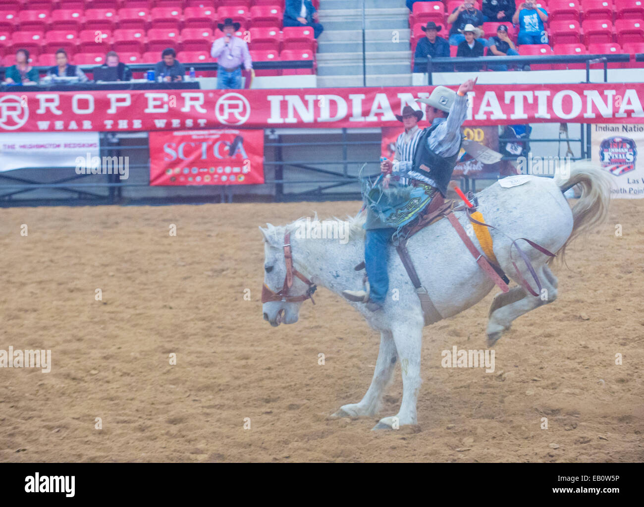 Cowboy Participating in a Bucking Horse Competition at the Indian