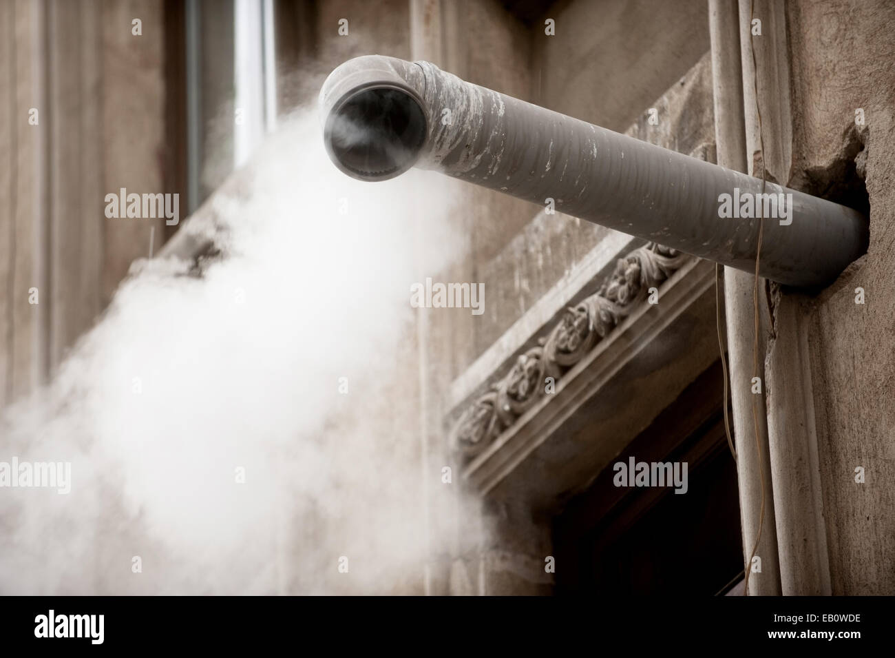 Steam coming out from a home tube pipe Stock Photo