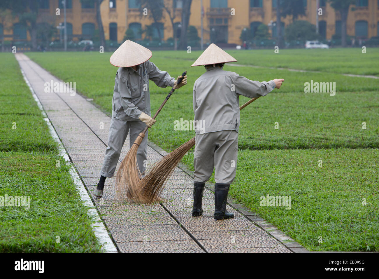 Vietnamese sweepers in Hanoi Vietnam Stock Photo