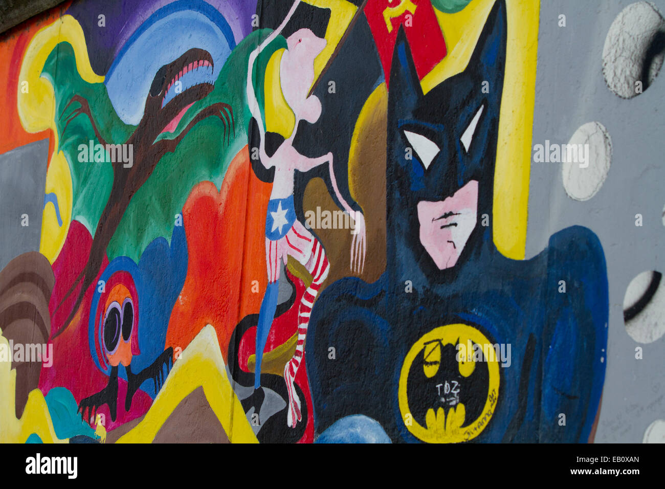 Berlin Wall Cartoon Graffiti street art Batman Stock Photo