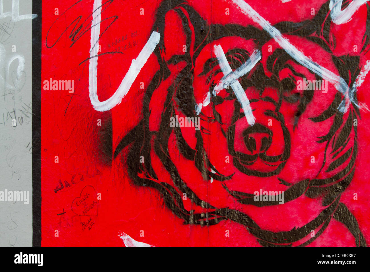 Berlin Wall bear Graffiti street art Tags red Stock Photo