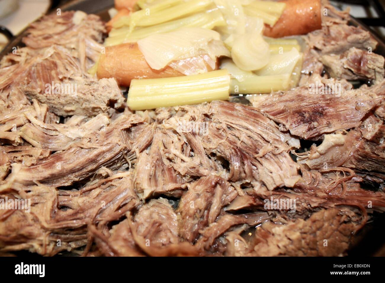 Boiled beef with carrots , celery and onions Stock Photo Alamy