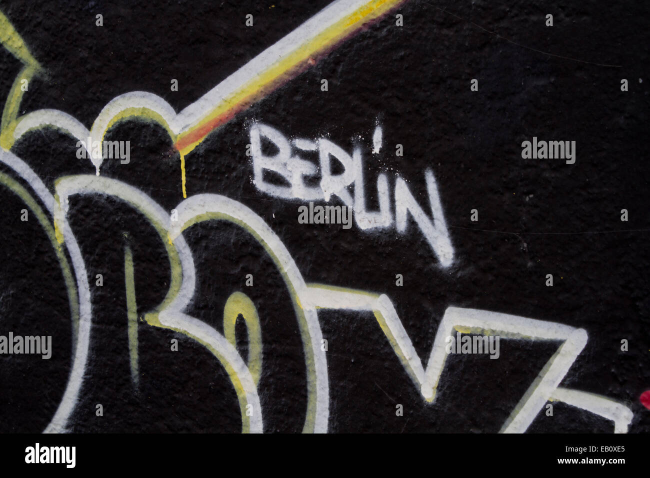 Berlin wall Street Art Graffiti tags black berlin Stock Photo