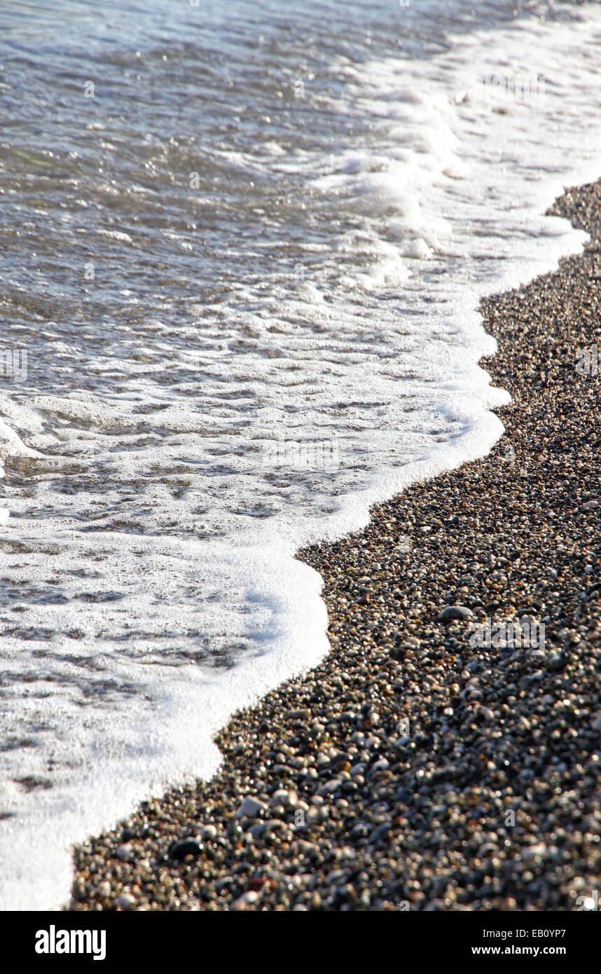 Pebble beach at the Mediterranean seacoast in Turkey Stock Photo