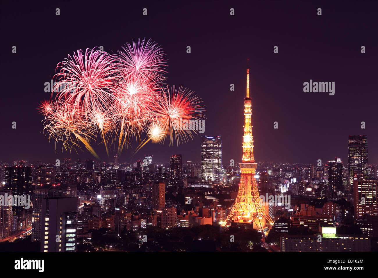 Fireworks celebrating over Tokyo cityscape at night, Japan Stock Photo ...