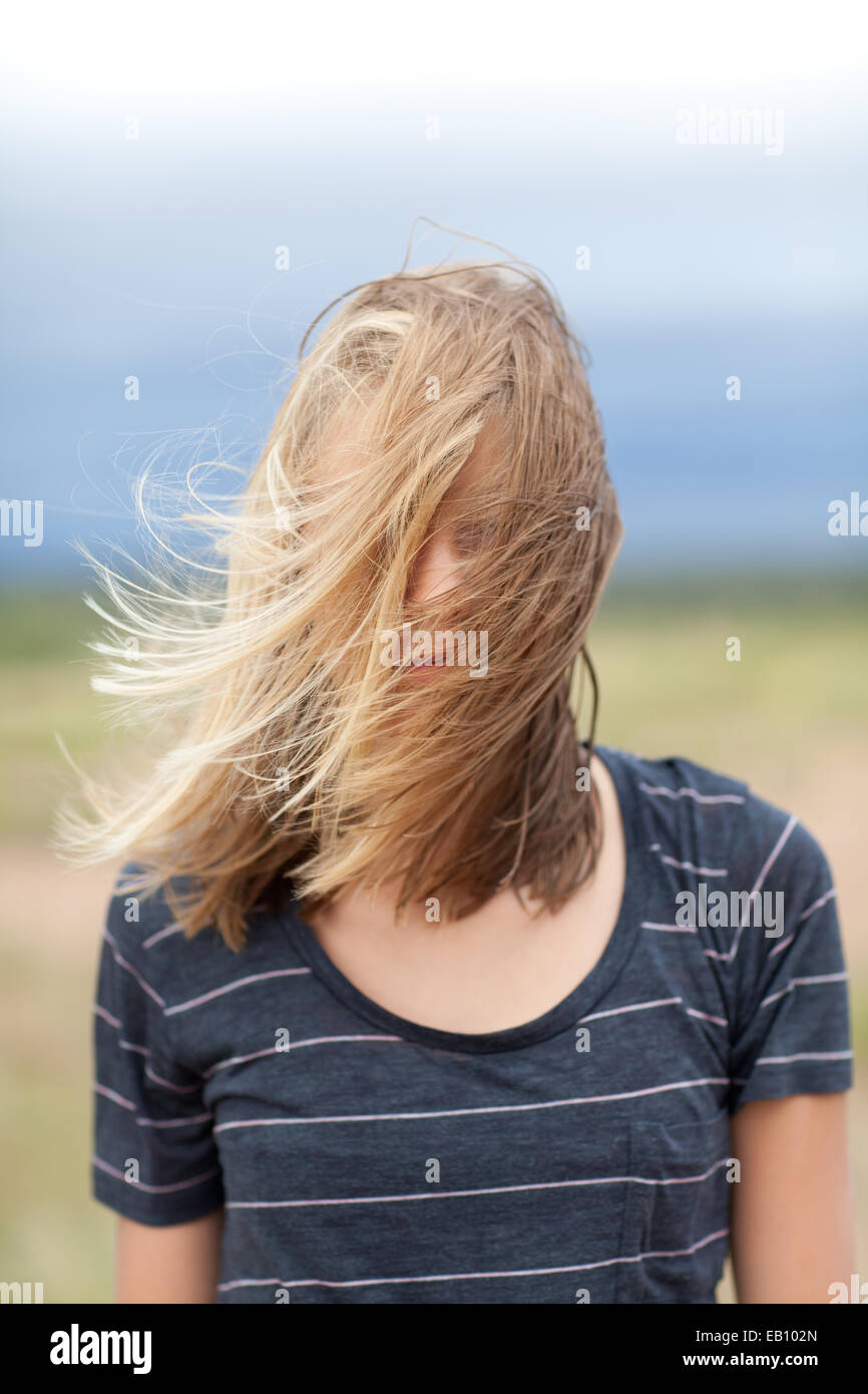 Girl on a windy day. Stock Photo