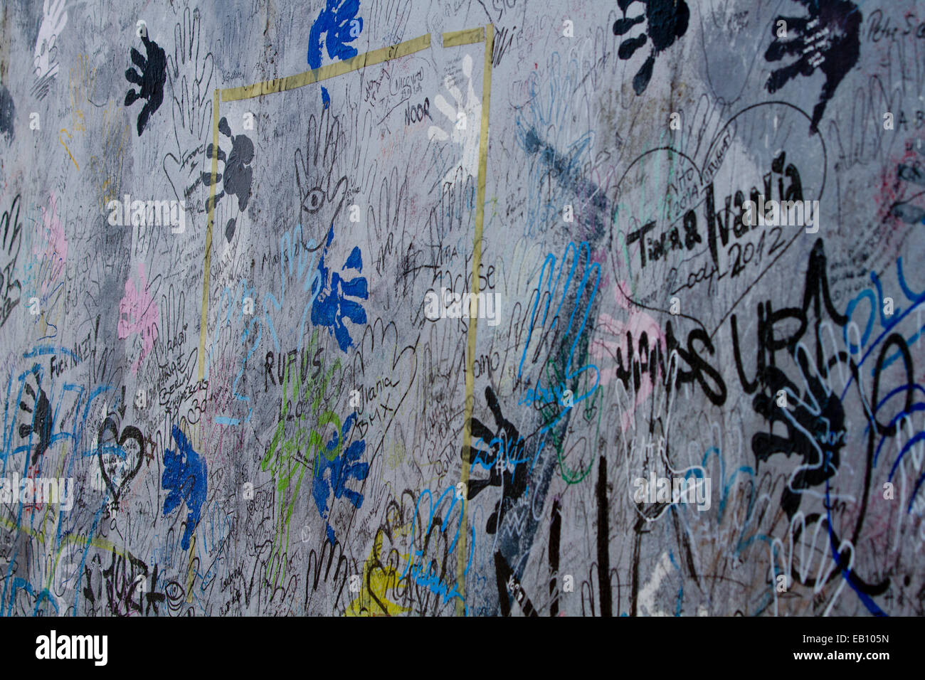 Graffiti hand prints street art Berlin wall urban Stock Photo