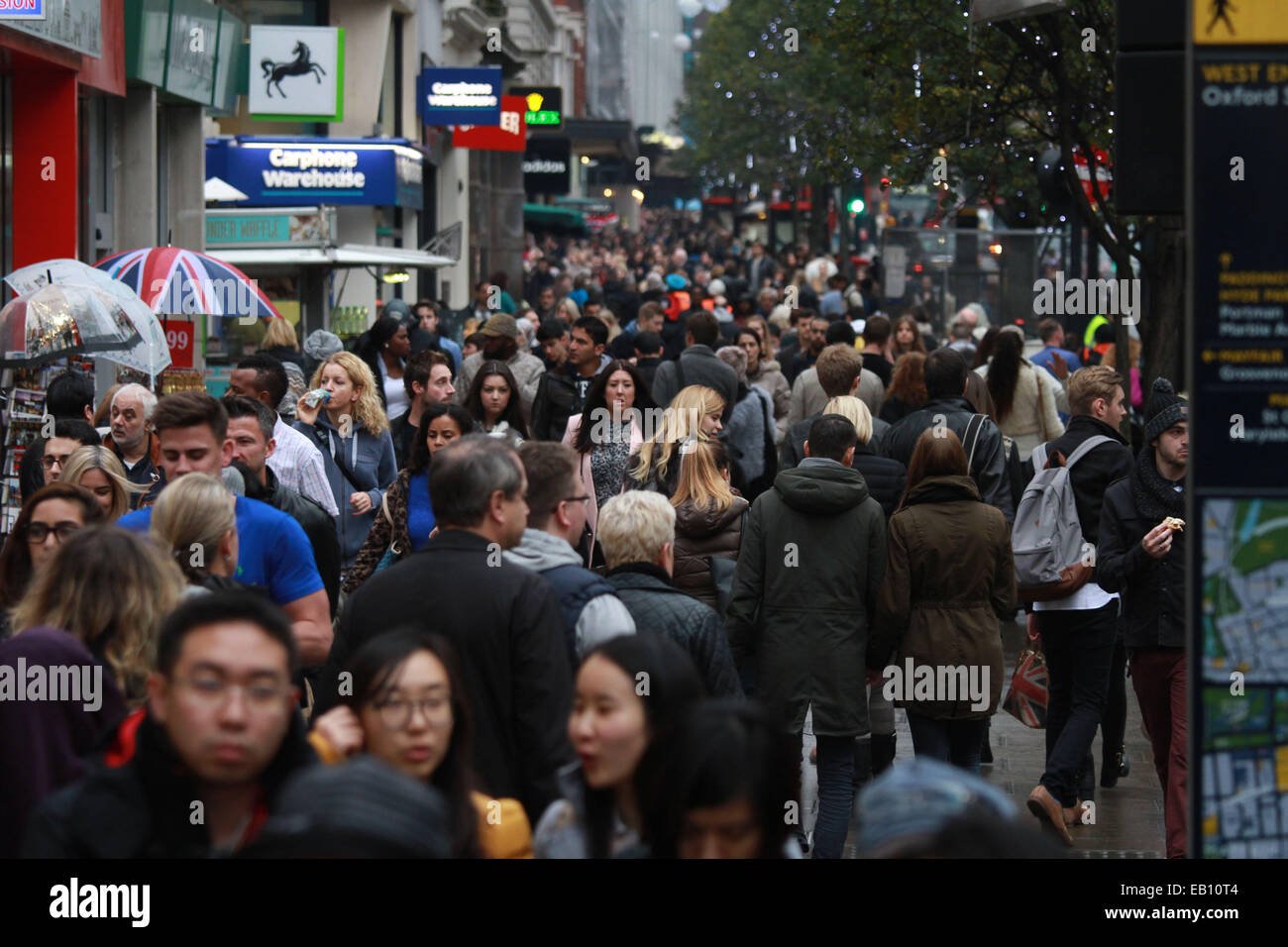 London, UK. 22nd November, 2014. Oxford Street in London is very busy with shoppers as shops are hoping for lots of sales in the run-up to Christmas which is just over one month away. Credit:  Paul Marriott/Alamy Live News Stock Photo