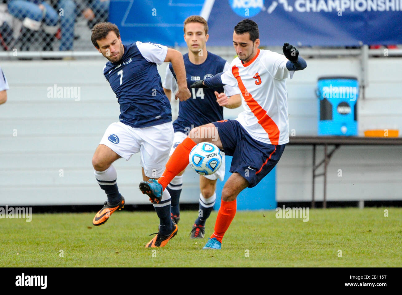 Syracuse, New York, USA. 23rd Nov, 2014. Penn State Nittany Lions midfielder Christian Kaschak (7) and Syracuse Orange midfielder Stefanos Stamoulacatos (9) battle for a loose ball during the first half of a 2014 NCAA Men's Soccer Tournament second round match between the Penn State Nittany Lions and the Syracuse Orange at the SU Soccer Stadium in Syracuse, New York. Syracuse defeated Penn State 2-1. Rich Barnes/CSM/Alamy Live News Stock Photo