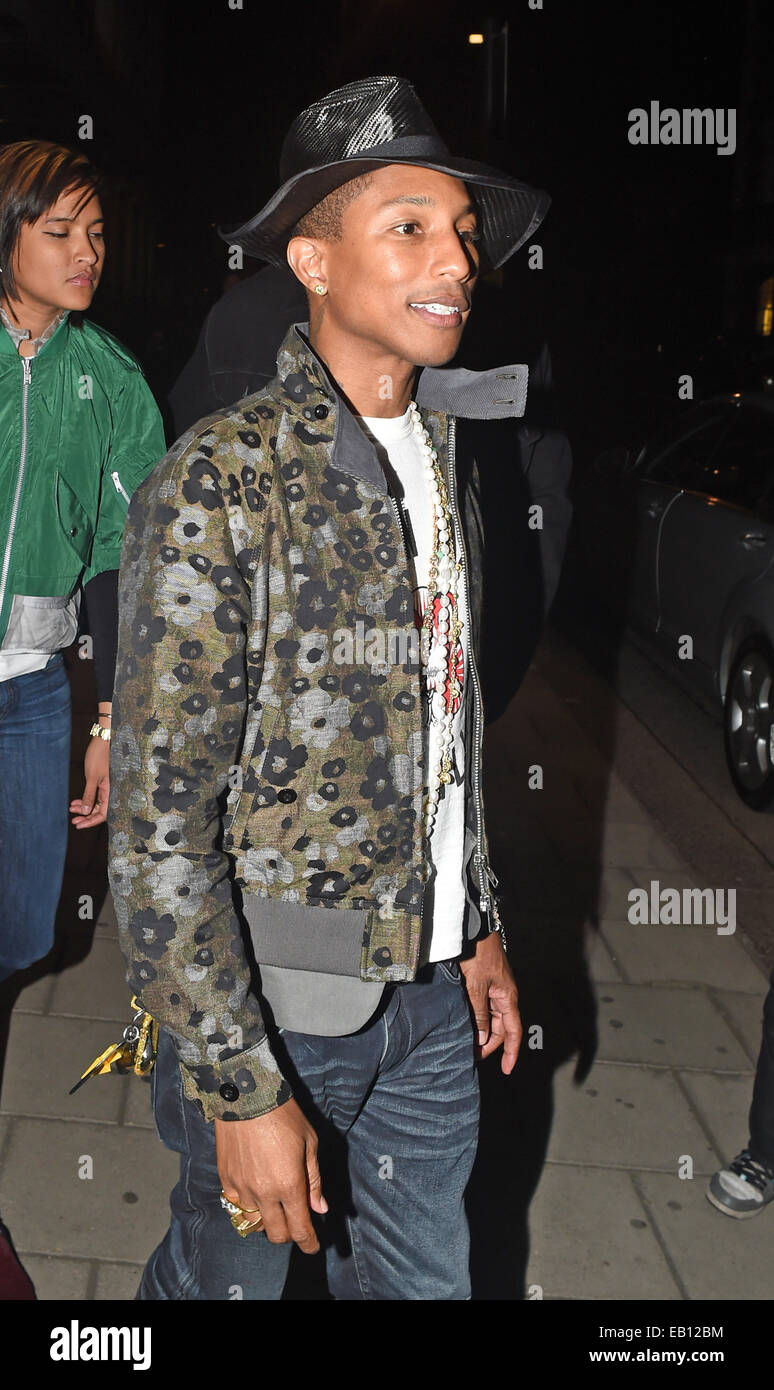 Singer Pharrell Williams is pictured leaving 34 restaurant in mayfair london wearing another different style hat.  Featuring: Pharrell Williams Where: London, United Kingdom When: 22 May 2014 Stock Photo