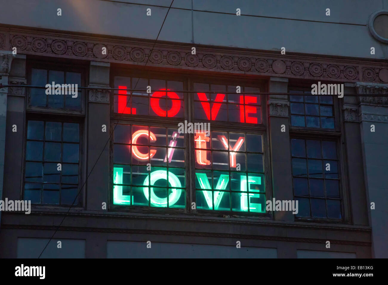 Love City Love lighted sign in a downtown Seattle, Washington window. Stock Photo