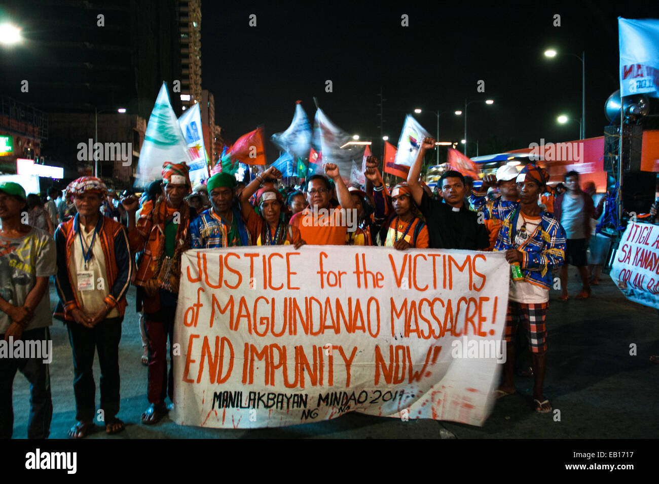 Lakbayan delegates from Mindanao marches towards the Redemptorist church in Baclaran, Paranaque. Hundreds of delegates from Mindanao, together with protest groups from southern Luzon held a candle lighting event in commemoration of the 5th anniversary of the Maguindanao massacre, where 58 people was murdered. 32 of the victims were journalists. © J Gerard Seguia/Pacific Press/Alamy Live News Stock Photo