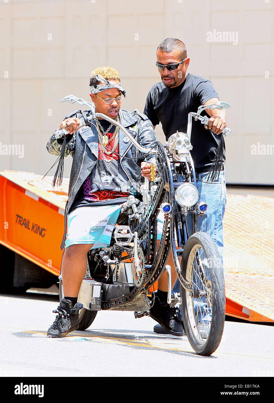 Rapper David Sebastian seen riding an electric bicycle around Beverly Hills  as he films a music video. Featuring: David Sebastian Where: Los Angeles,  California, United States When: 22 May 2014 Stock Photo - Alamy