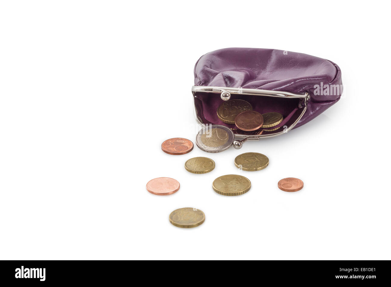 Purple leather purse with euro coins isolated on white background Stock