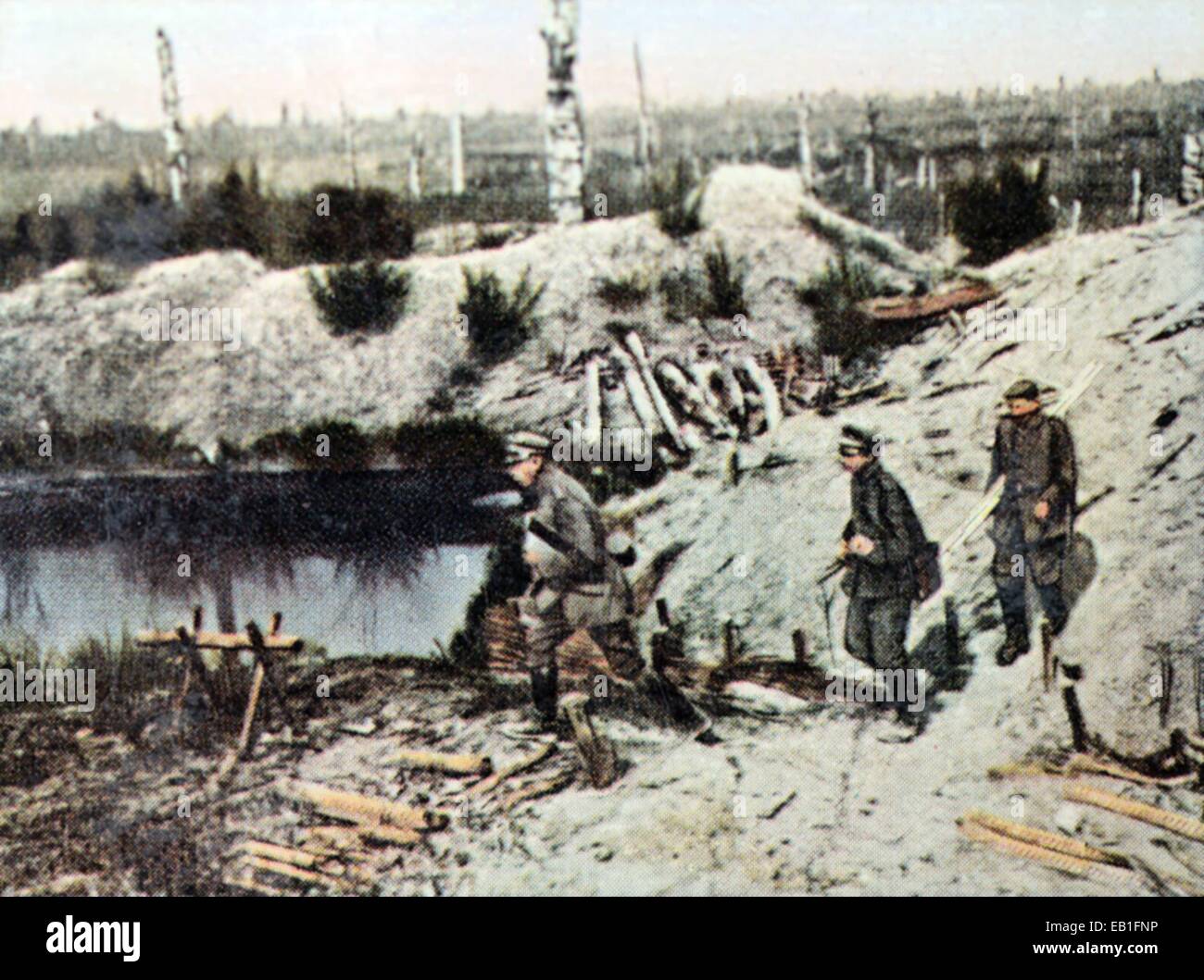 The contemporary colorized German propaganda photo shows German land survey troops looking for materials for carts in trench warfare along the Western Frtont, 1915/1916. Photo: Neumann Archive - NO WIRE SERVICE Stock Photo